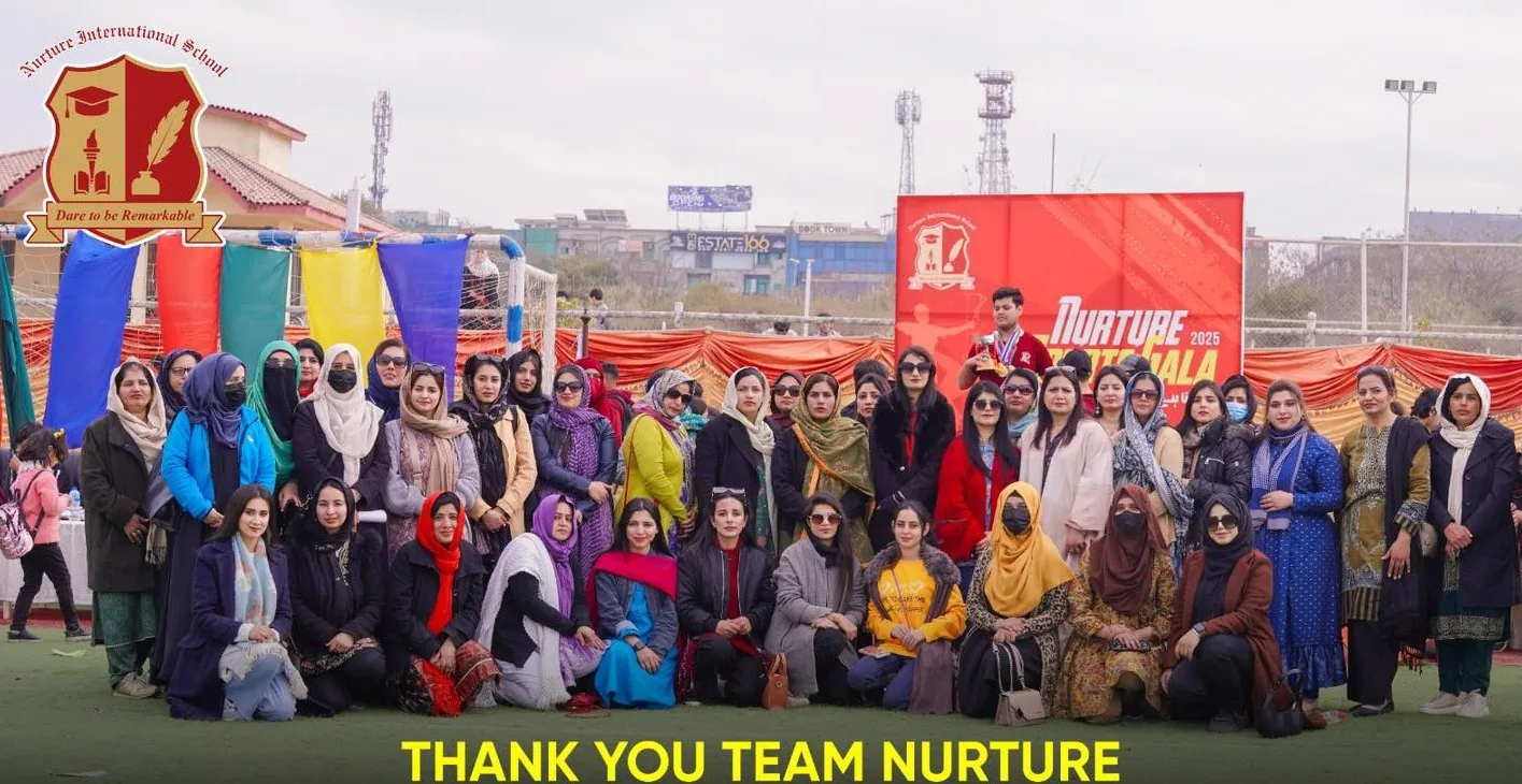 A large Nurture school community group gathered outdoors